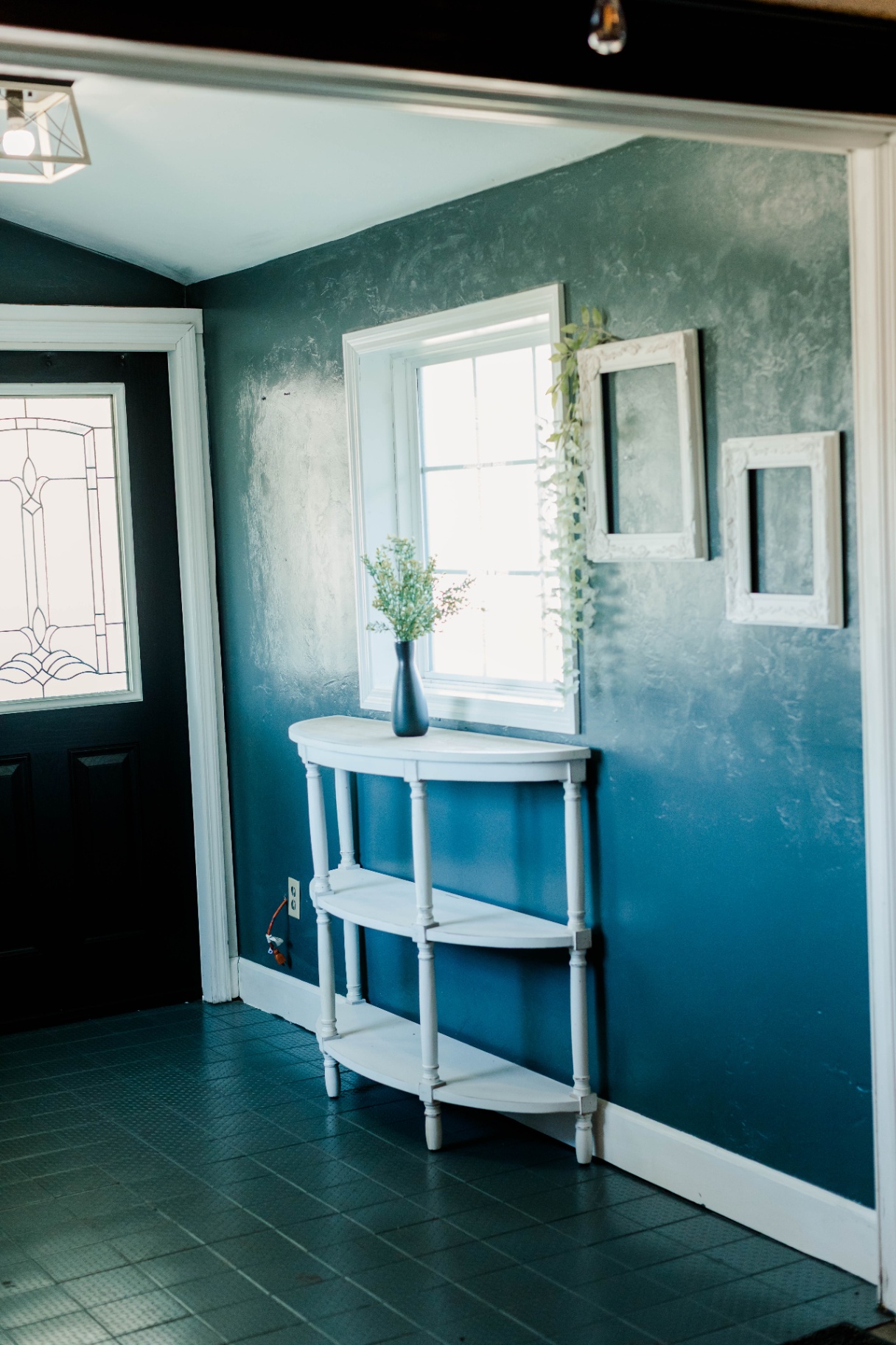 The Foyer — A quiet welcome by the entry at Fields of Grace Farmhouse in Lake Butler, FL