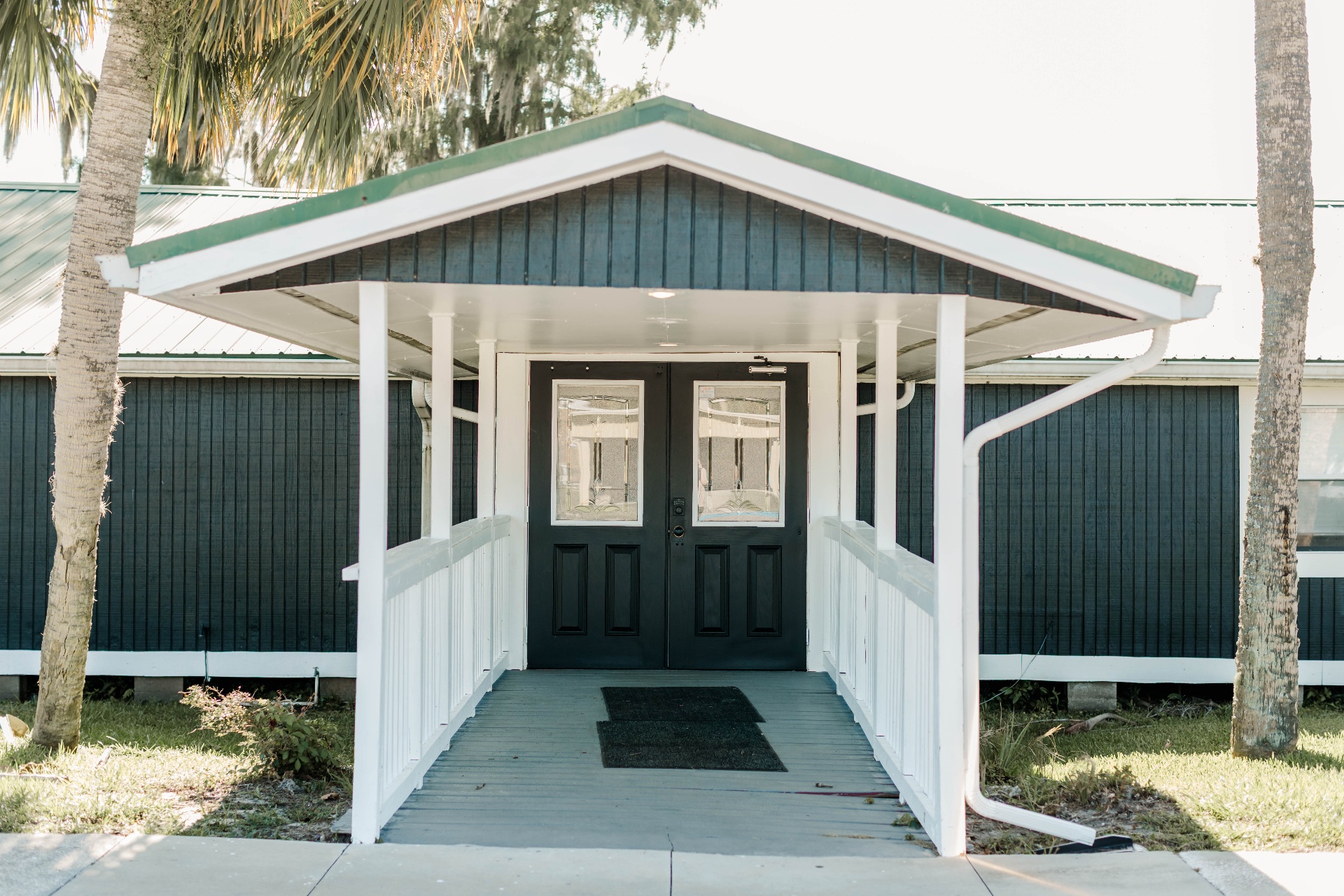 Welcome In — The front entrance at Fields of Grace Farmhouse in Lake Butler, FL